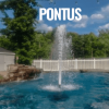 Pontus shallow water fountain creating an elegant vertical spray in a pond."