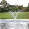 Kasco 4400 Cypress 1 HP J Series Fountain with a multi-tiered spray pattern in a pond.