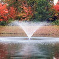 Kasco VFX Pond and Lake Fountain during fall season with vibrant foliage.